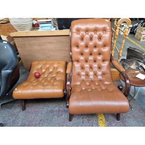 403 - Stay Lot : A handsome armchair and foot rest set with button-back detail, brown leather upholstery a... 