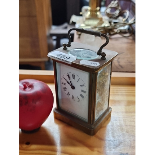 469 - Star Lot : An antique Edwardian carriage clock featuring lovely enameled face boasting Roman numeral... 