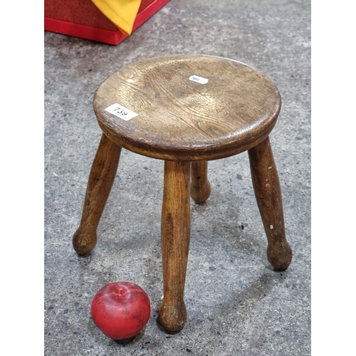 739 - A Fabulous small antique four legged farmhouse oak milking stool. Provenance: from Palladian stately... 