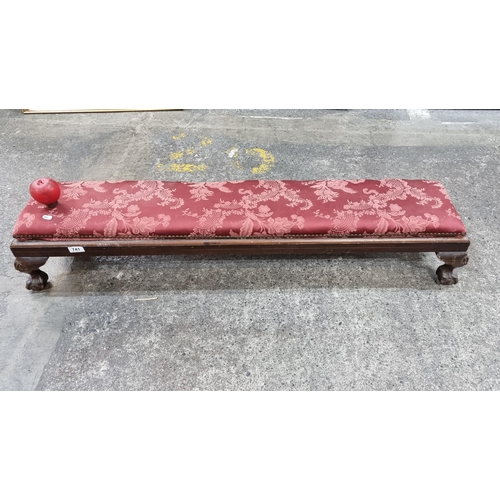 741 - Star Lot : An antique long upholstered padded fireside bench / footstool. Features carved claw and b... 