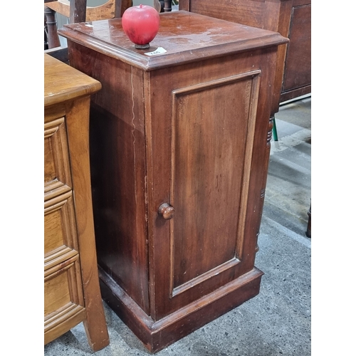 746 - A vintage wooden bedside locker with interior shelf and panel detail.
H 75cm x W 38cm x D 36cm.  Pro... 