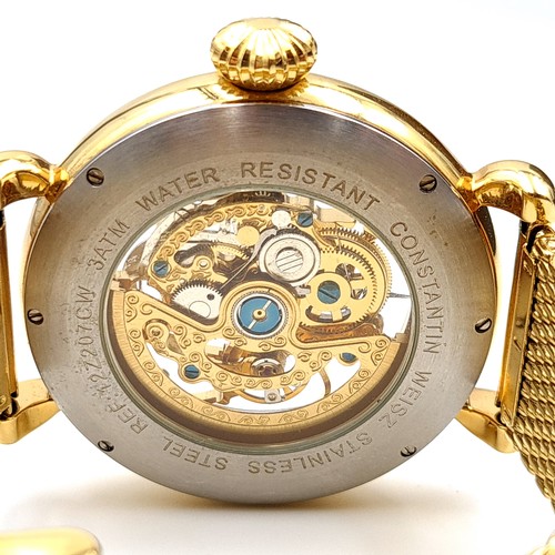 10 - Star Lot : An unusual Constantin Weisz model T30CW gold toned wrist watch, featuring a display hour,... 