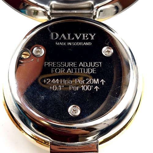 17 - A stylish Dalvey of Scotland barometer, featuring a polished chrome dual toned casing and featuring ... 