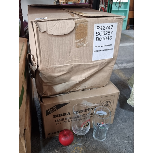 753 - Two brand new boxes of pub pint glasses including 24 Heineken glasses along with 24 Birra Moretti gl... 