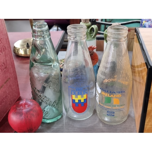 757 - Three vintage glass milk bottle's including a commemorative Italia 90 example.