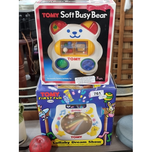 761 - Two brand new boxed Tomy baby toys including a lullaby dream show.