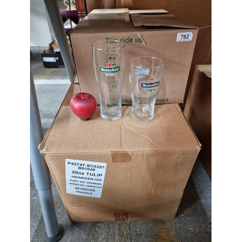 762 - Two complete boxes of Heineken pub pint glasses. (72 in total)