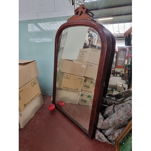 773 - A beautiful high quality heavy  mahogany over mantle mirror with carved wooden pediment to top. Came... 