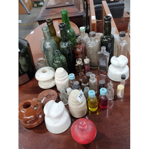 794 - Approx. 43 items including vintage glass medicine and alcohol bottles along with ceramic electrical ... 