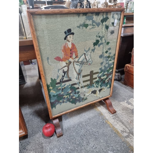 812 - A charming antique convertible fire screen featuring a hand embroidered hunting scene to front. Pane... 