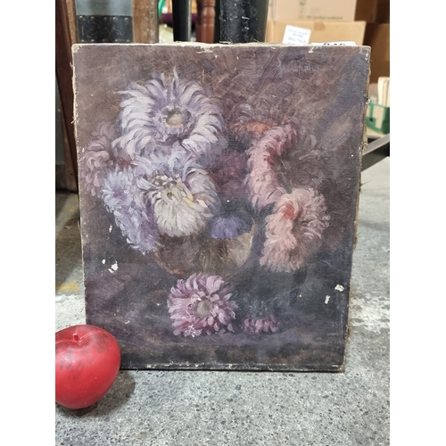 840 - A beautiful early 20th century oil on canvas painting featuring a still life of dahlia flowers in so... 