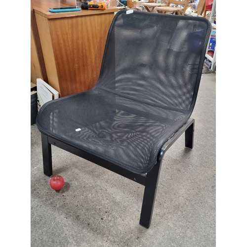 871 - A generously proportioned modern chair. A stylish example with a black mesh seat and a cast metal fr... 