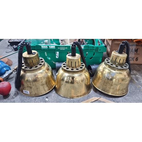 872 - Three large striking brass drop lights.