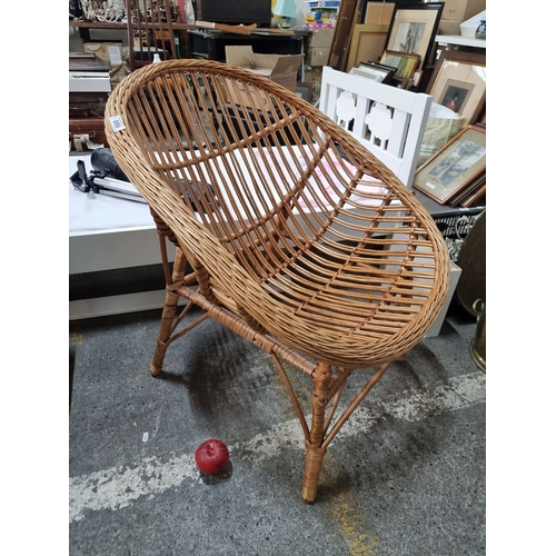 880 - A wonderful vintage rattan armchair.