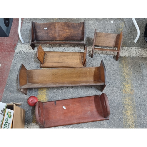 881 - A mixed lot of five antique book troughs including sliding examples.