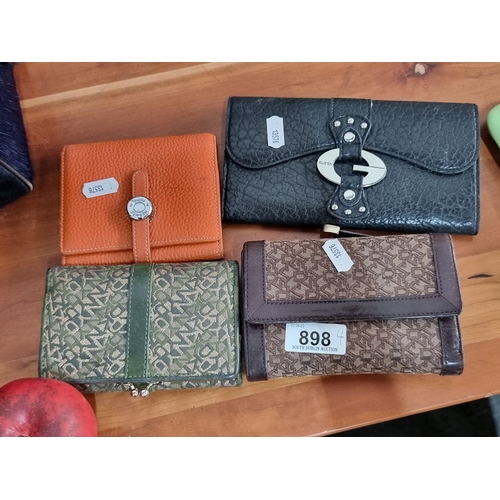 898 - A lot of four ladies purses including a DKNY and Guess example.