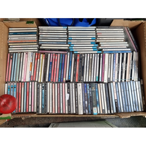 946 - A box with a large collection of approx. 150 CDs including The Beatles, Bob Marley and Tom Jones.