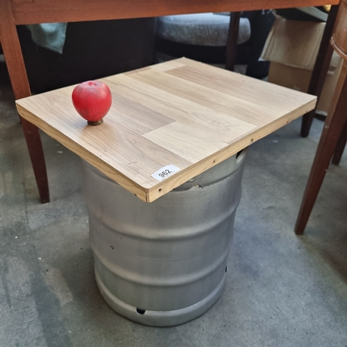 962 - A neatly sized table crafted from a wooden panel and a metal Diageo Ireland barrel. Great for outdoo... 