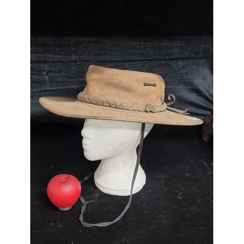 734 - A genuine vintage leather Jackaroo  hat with braided detail to top and a Jackaroo pin. Size L Proven... 