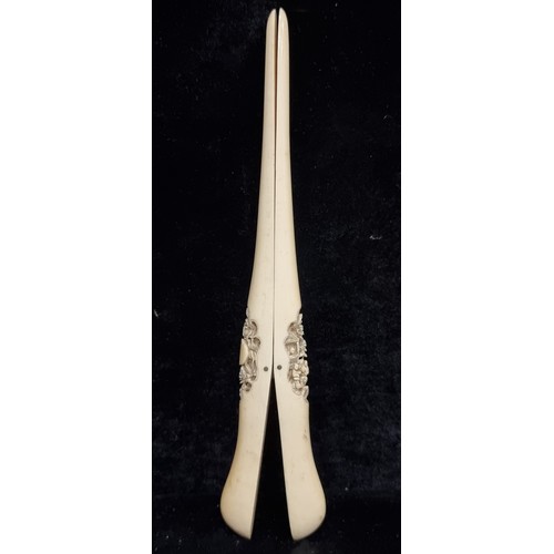 151 - A fabulous pair of late nineteen century Cantonese bone glove stretchers, of typical form comprising... 