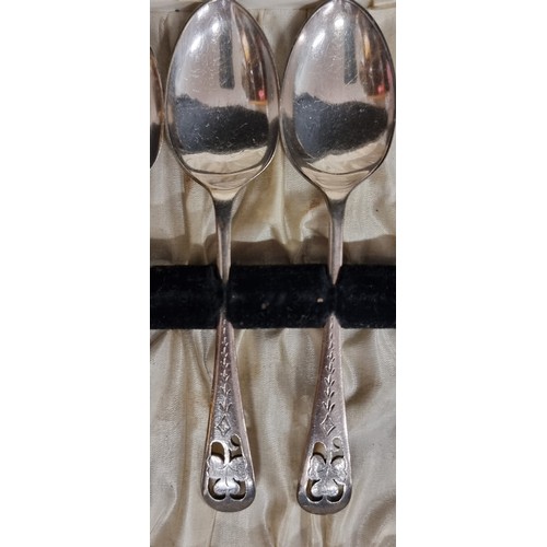 152 - A collection of twelve stunning Twentieth century teaspoons with pierced shamrock to top, stamped FC... 