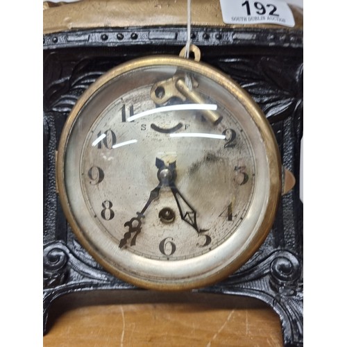 192 - Star Lot : An ornate vintage German made mantle clock topped with a man leading two horses in gilded... 