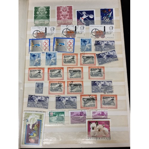 242 - A good  collection of world stamps including a large amount from Russia.