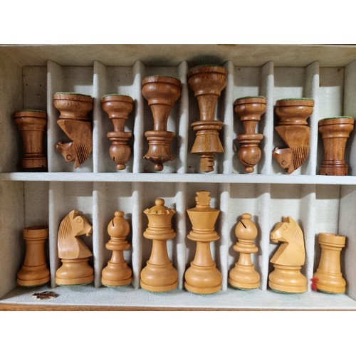 261 - An elegant complete chess and checkers set comprising of a wooden box with a glass panel, a shelf ho... 