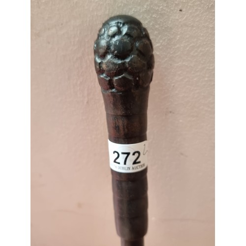 272 - A vintage ebonised walking stick along with a blackthorn example.