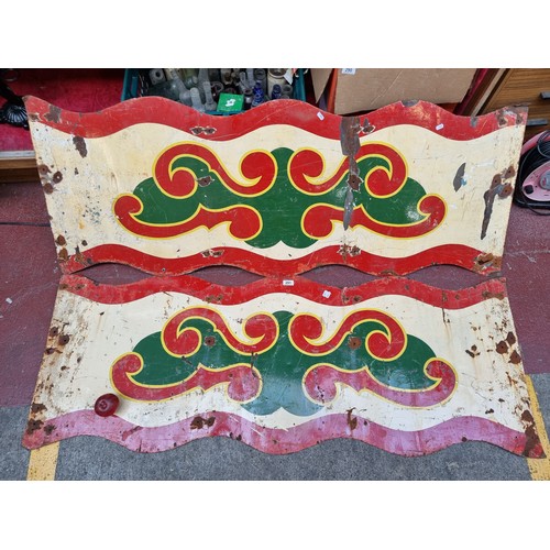 291 - Two very heavy 1930's  metal hand printed fair ground panels, featuring bright festive colours and a... 