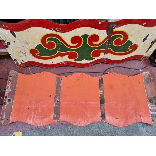 291 - Two very heavy 1930's  metal hand printed fair ground panels, featuring bright festive colours and a... 