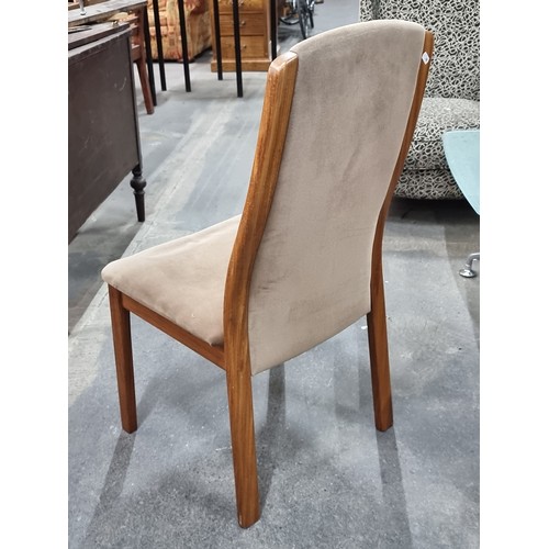 335 - A magnificent set of four mid century G Plan teak dining chairs. Upholstered with a caspian brown se... 