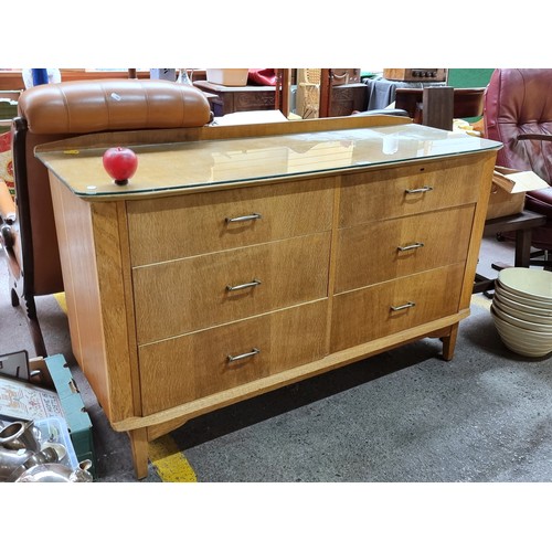 420 - A mid century  six drawer glass topped sideboard with gallery back. Birch construction with gallery ... 