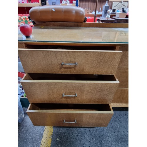 420 - A mid century  six drawer glass topped sideboard with gallery back. Birch construction with gallery ... 