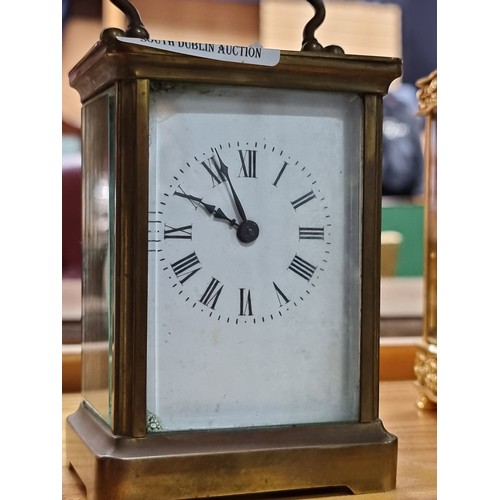 469 - Star Lot : An antique Edwardian carriage clock featuring lovely enameled face boasting Roman numeral... 