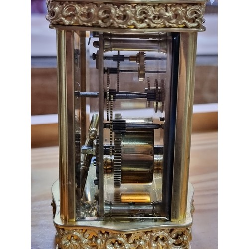 470 - Star Lot : A very attractive antique Edwardian carriage clock made by Sharman D. Neill Belfast. Feat... 