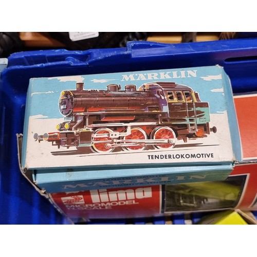 479 - A Lima Micromodel N.Scale electronic train set made in Italy, in original box and packaging. Along w... 