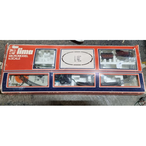 479 - A Lima Micromodel N.Scale electronic train set made in Italy, in original box and packaging. Along w... 