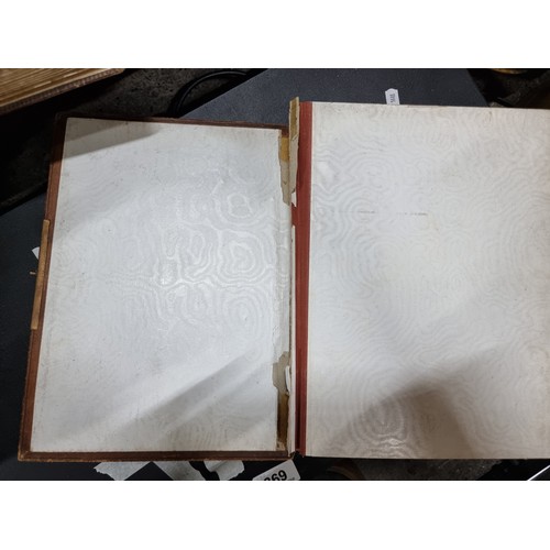 802 - Star Lot : A Victorian photo album containing 24 pages full of portraits. Held in a leather bound ha... 