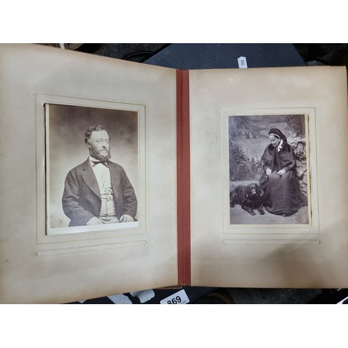 802 - Star Lot : A Victorian photo album containing 24 pages full of portraits. Held in a leather bound ha... 