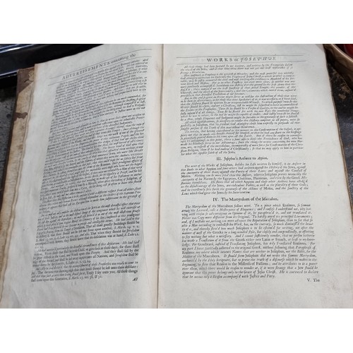 806 - Star Lot: An antique 1693 hardback book titled 'The Works of Josephus by Arnold D'Andilly translated... 