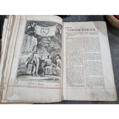 808 - Star Lot: A large antique book titled 'The History of the Old and New Testament' published and print... 