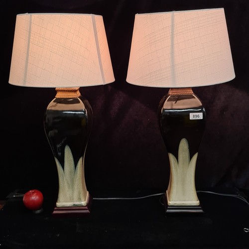 896 - A fabulous pair of two-tone ceramic table lamps, with circular cream shades and three pin plug. RRP ... 