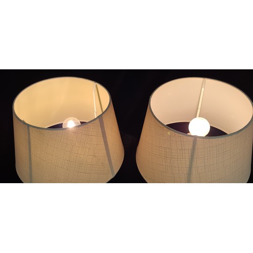 896 - A fabulous pair of two-tone ceramic table lamps, with circular cream shades and three pin plug. RRP ... 