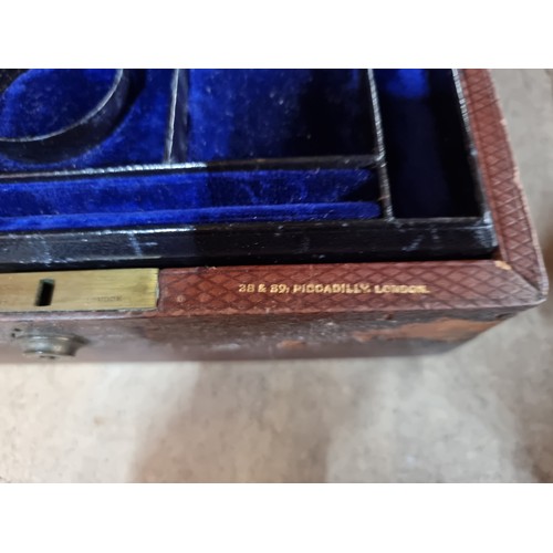 877 - A charming antique leather Leuchars & Son Makers jewellery box opening to reveal two velvet lined pu... 