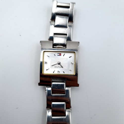 32 - A stylish designer Tommy Hilfiger ladies wrist watch, featuring a metal bracelet and unusual rectang... 