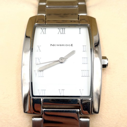 56 - A boxed as new gents Newbridge Silverware wrist watch, featuring a thick bracelet and in as new cond... 