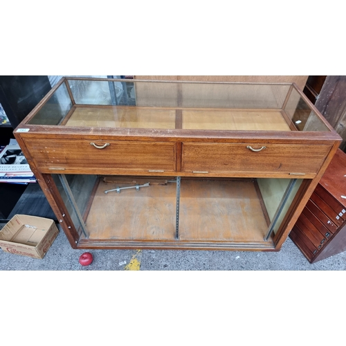 927 - Star Lot - A handsome vintage commercial shop display counter. A nice teak wood example with glazed ... 