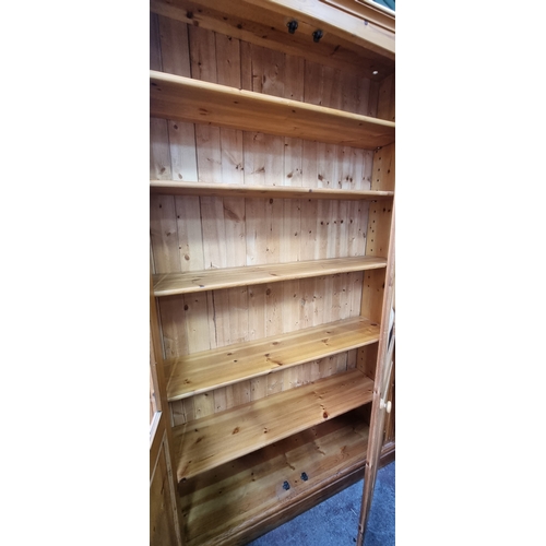 930 - Star Lot : A fantastic double shelving unit with a glass fronted cabinet with two doors revealing fi... 