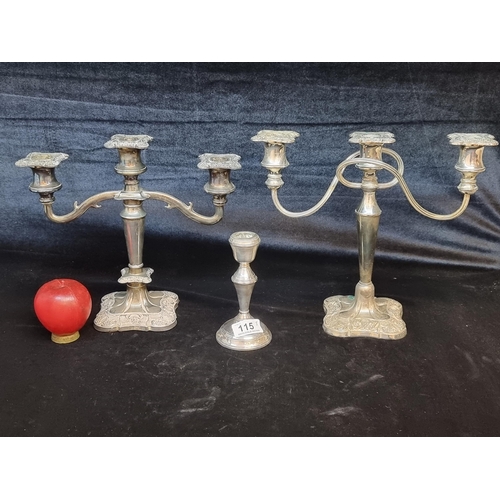 115 - Three items including an Irish sterling silver candle stick  and two silver plated three branch cand... 